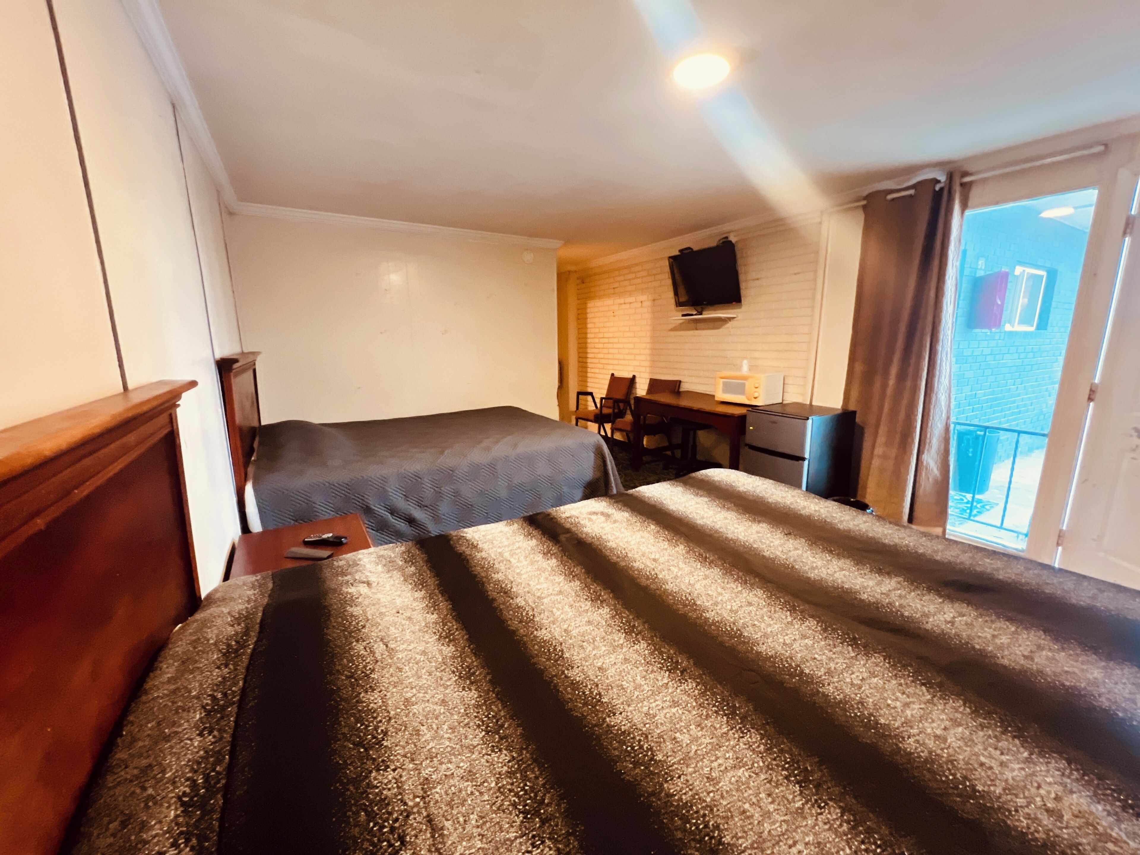 Room, 2 Queen Beds, Non Smoking | Desk, iron/ironing board, free WiFi, bed sheets