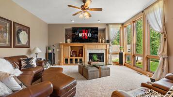 Smart TV, fireplace, DVD player, foosball