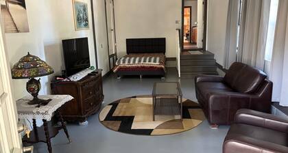 Furnished Studio with washer and dryer, and pool!