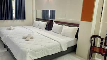 Family Quadruple Room, Balcony, City View | Premium bedding, down duvets, pillow-top beds, individually furnished