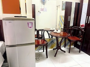 Family Quadruple Room, Balcony, City View | Premium bedding, down duvets, pillow-top beds, individually furnished