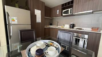 Fridge, microwave, coffee/tea maker, toaster