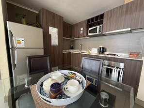 Fridge, microwave, coffee/tea maker, toaster