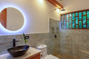 Shower, hair dryer, towels, soap