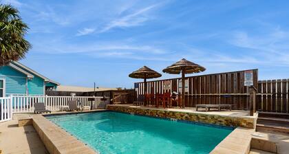 Coastal, dog-friendly townhouse with shared pool & large yard - steps to sand