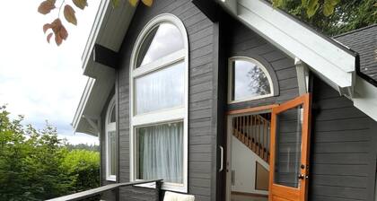 Waterfront Escape with Mountain Views, Loft & Coastal Charm
