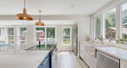 Bright & breezy beach house w/ private backyard, central AC, & relaxing hot tub