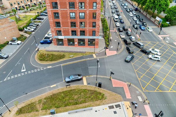 A multi-level parking structure with cars parked in designated spaces.