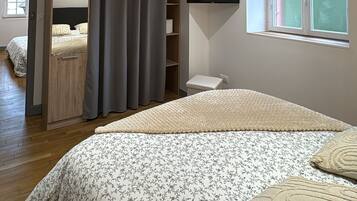 3 slaapkamers, een strijkplank/strijkijzer, wifi, beddengoed