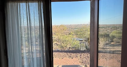 Unique top of the world straw bale cottage has ASTOUNDING views.