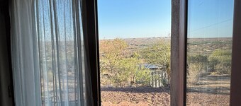 Unique top of the world straw bale cottage has ASTOUNDING views.