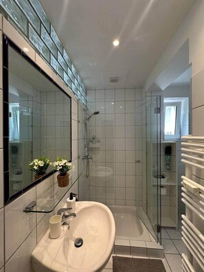 Hair dryer, towels, soap, shampoo
