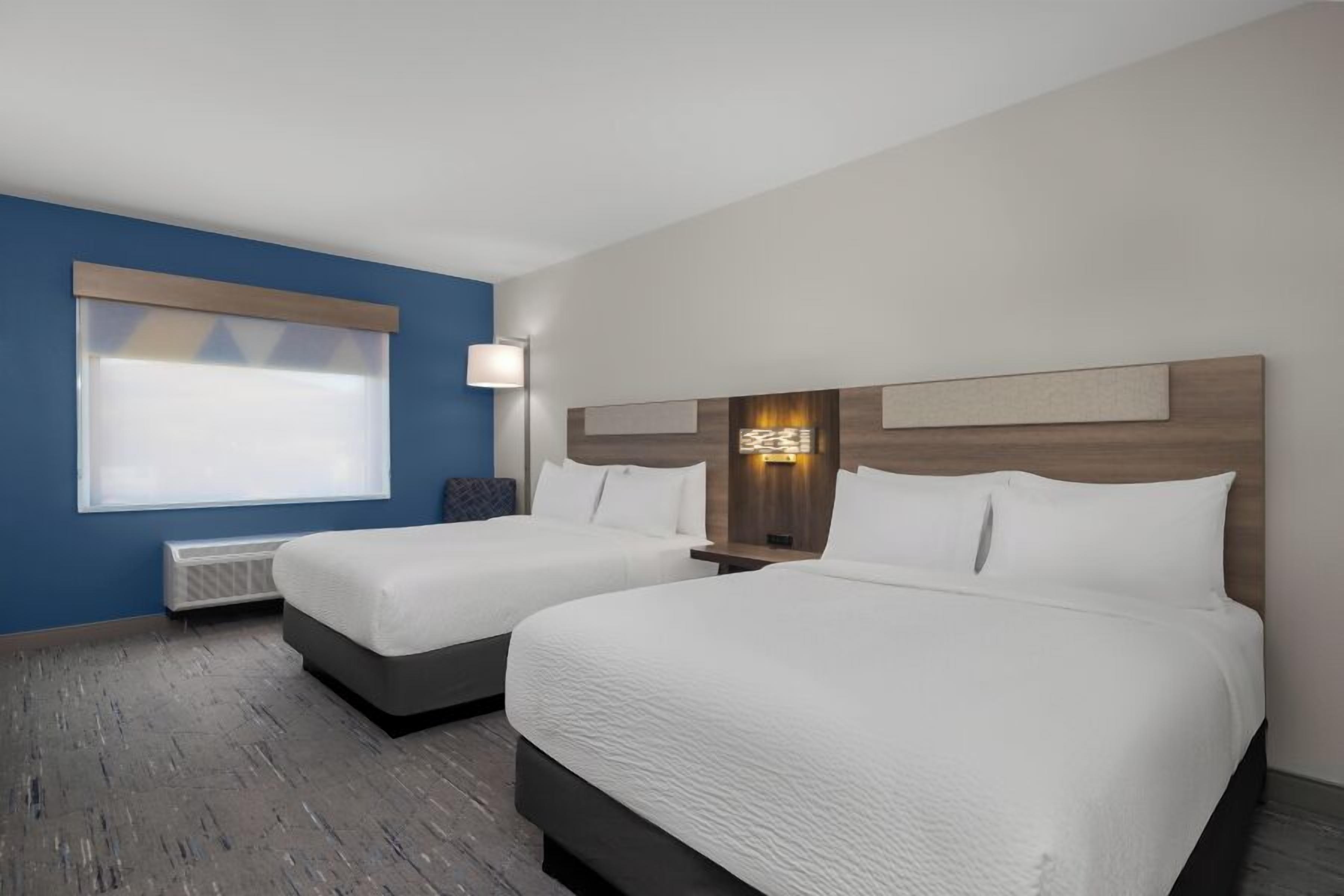 Standard-huone, 2 keskisuurta parisänkyä | Pimennysverhot, silitysrauta/-lauta, ilmainen Wi-Fi, vuodevaatteet