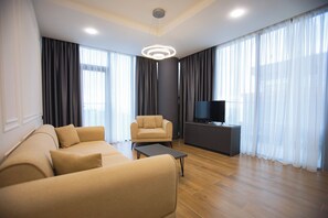 Familjelägenhet | Vardagsrum | 40-tums LED-tv med digitalkanaler