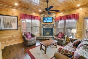 Una televisión, una chimenea, videojuegos