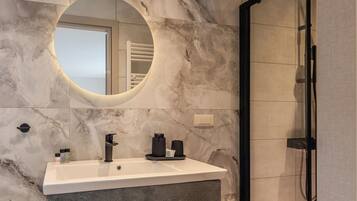 Panoramic Suite, Sea View | Bathroom | Shower, rainfall showerhead, free toiletries, hair dryer