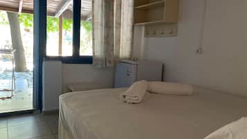 Quarto econômico, ao lado da praia | Wi-Fi de cortesia