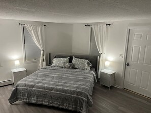 1 bedroom, desk, iron/ironing board, travel crib