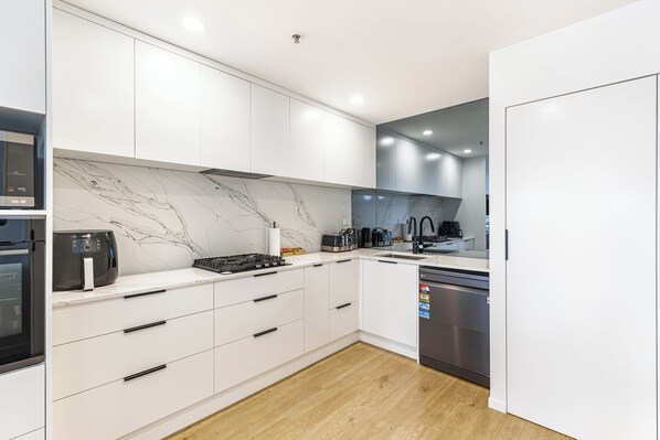 Apartment | Private kitchen | Fridge, microwave, oven, stovetop