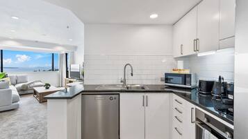 Apartment | Private kitchen | Fridge, microwave, oven, stovetop