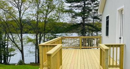 Cozy Lakefront Cottage with Stunning Views, Deck, BBQ Grill, and Outdoor Firepit