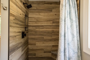 Shower, hair dryer, towels, shampoo