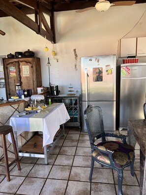 Full-sized fridge, microwave, oven, cookware/dishes/utensils