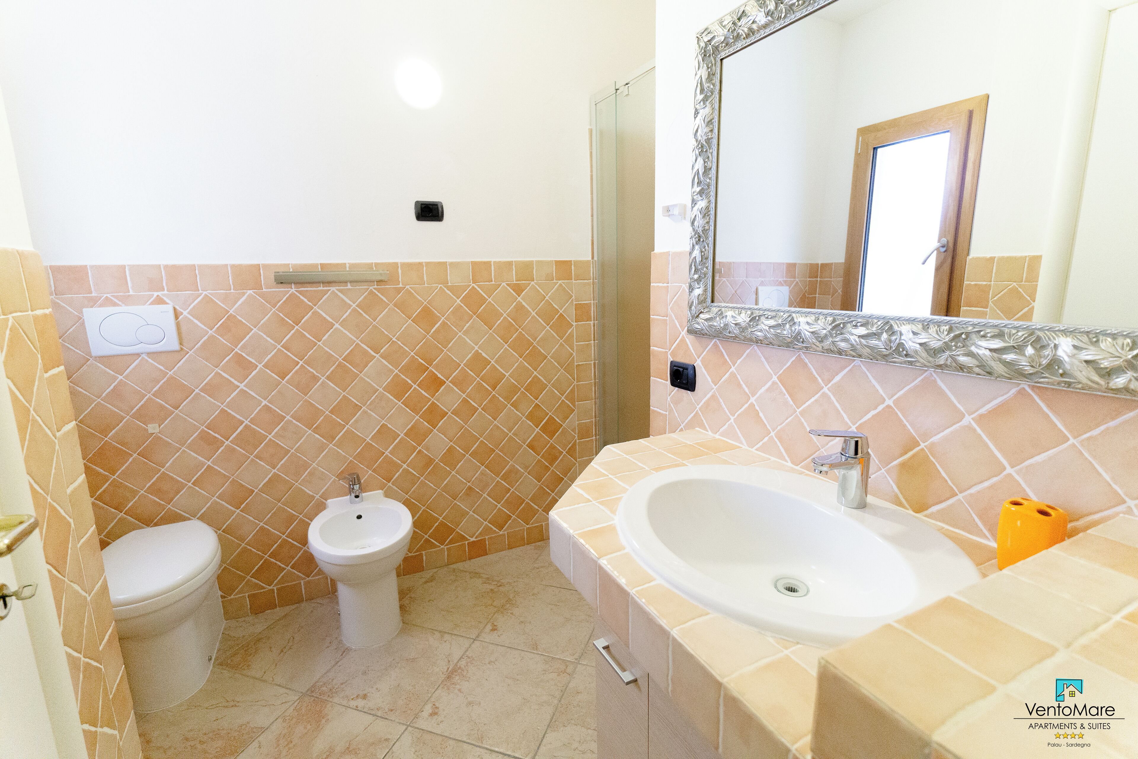 Premium Apartment, Patio, Courtyard View | Bathroom | Shower, hair dryer, bidet, towels