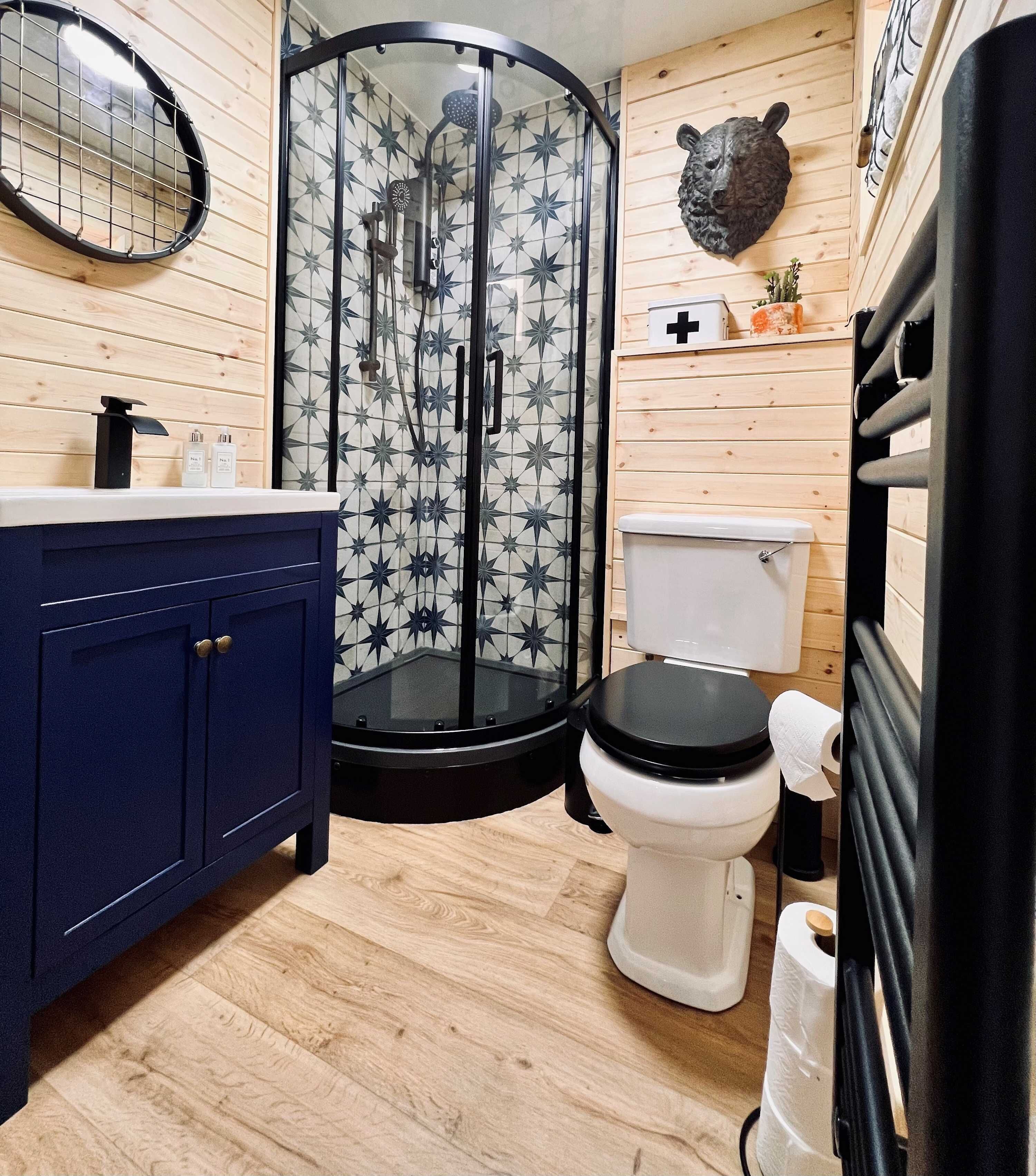 Shower, hair dryer, towels, shampoo