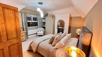 2 habitaciones, tabla de planchar con plancha y cuna de viaje