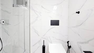 Hair dryer, towels, soap, toilet paper