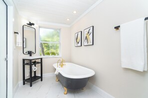 Shower, hair dryer, towels, toilet paper