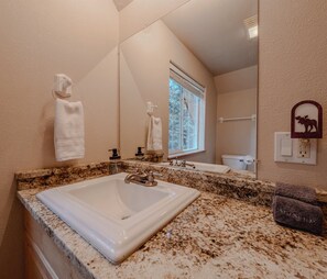 Cabin, Multiple Beds, Patio (Whitetail Cabin) | Bathroom | Hair dryer, towels