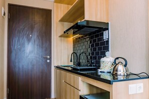 Standard Studio | Private kitchen - Comfort And High Floor Studio Room At Transpark Bintaro Apartment (South Tangerang)