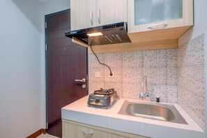 Standard Apartment | Private kitchen - Comfort 1Br At Royal Heights Apartment (Bogor)