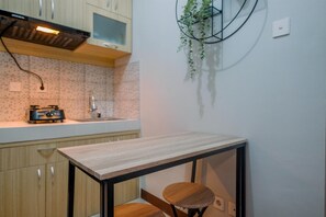 Standard Apartment | Dining room - Comfort 1Br At Royal Heights Apartment (Bogor)