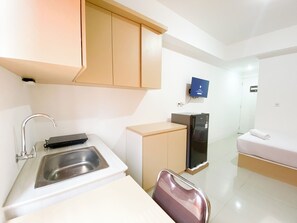 Standard Studio | Private kitchen - Well Furnished And Cozy Studio Paltrow City Apartment (Semarang)