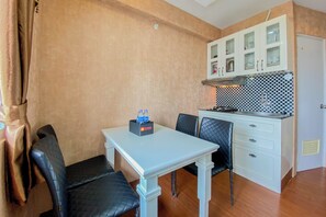 Standard Apartment | Dining room - Pleasant And Modern Look 1Br Green Pramuka City Apartment (Jakarta)