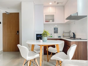 Standard Apartment | Dining room - Best Place And Homey 2Br At Tamansari Iswara Apartment (Bekasi)