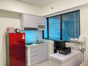 Standard Apartment | Private kitchen - Homey And Good 2Br At Meikarta Apartment (Cikarang)