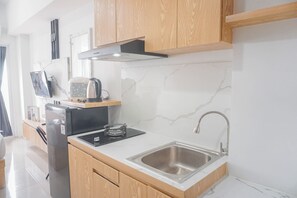 Standard Studio | Private kitchen - Good Choice Studio Apartment Tamansari Mahogany Karawang (Karawang)