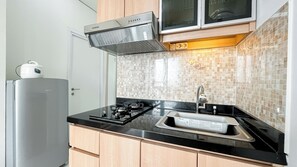 Standard Apartment | Private kitchen - Restful And Homey 2Br At Green Pramuka City Apartment (Jakarta)