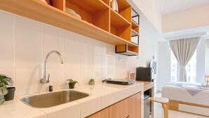 Standard Studio | Private kitchen - Warm And Good Studio Room At Tokyo Riverside Pik 2 Apartment (Teluknaga)