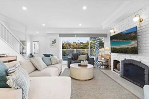 TV, fireplace, books, offices