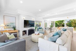 TV, fireplace, books, offices