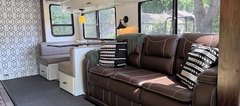 Modern RV on a serene, adventure filled property with AC, WiFi