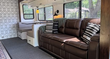 Modern RV on a serene, adventure filled property with AC, WiFi