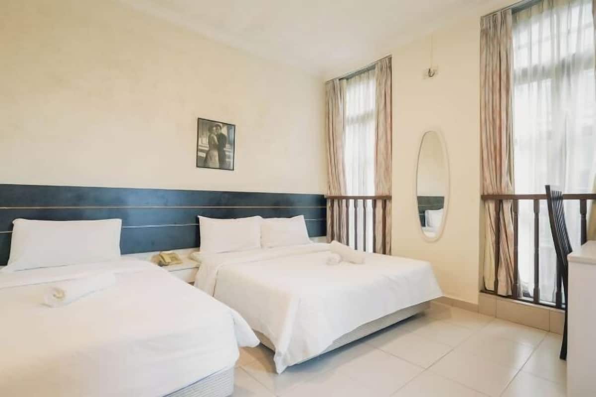 Desk, laptop workspace, free WiFi, bed sheets