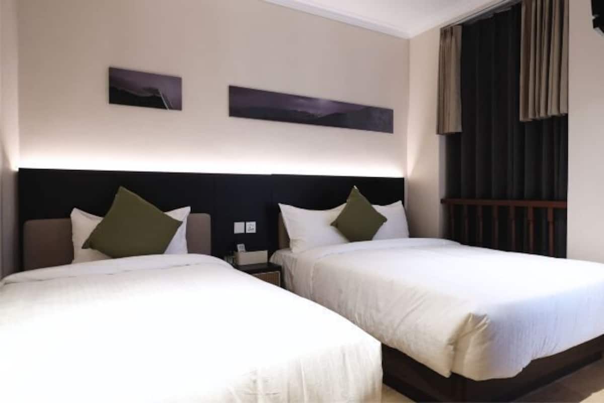 Desk, laptop workspace, free WiFi, bed sheets