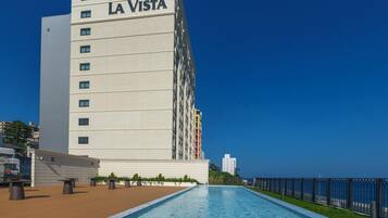 A hotel named LA VISTA with a pool area.